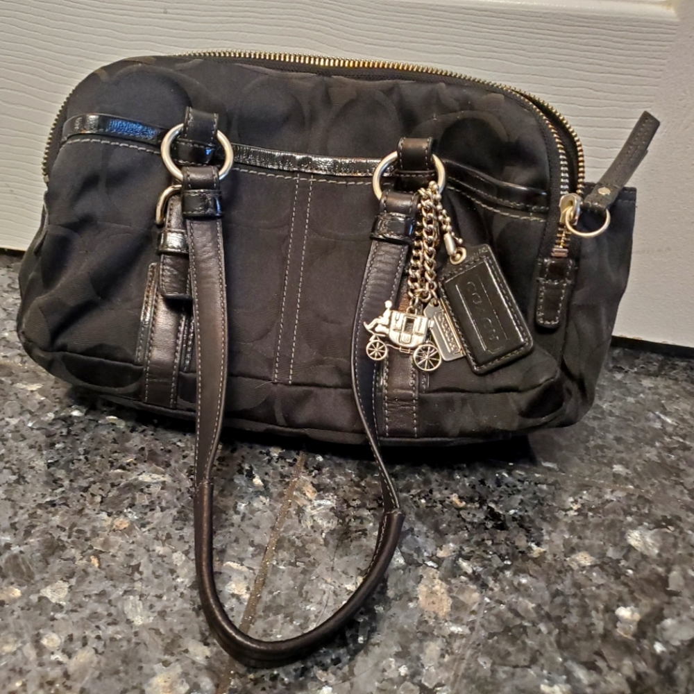 Coach signature black shoulder bag.